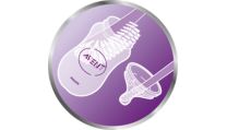 Brosse à bout recourbé et embout spécial tétine