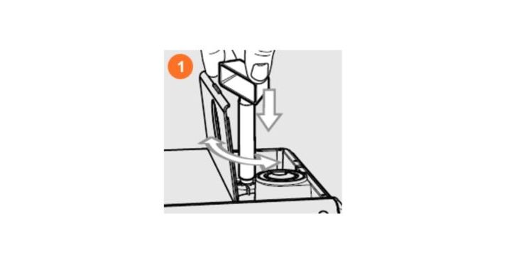 Adjusting grind settings on Philips espresso machine with grinder adjustment key