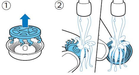 Philips shaver shaving heads being cleaned