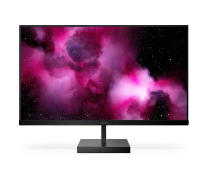 Un monitor di computer con un display illuminato di un monitor nero con una  luce blu e rosa illuminata.