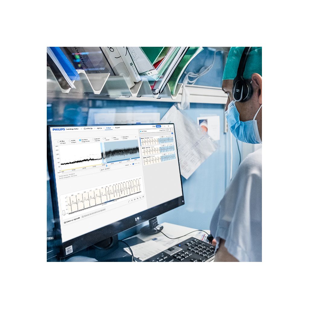 A clinician reviews ECG data using Cardiologs Holter. 
