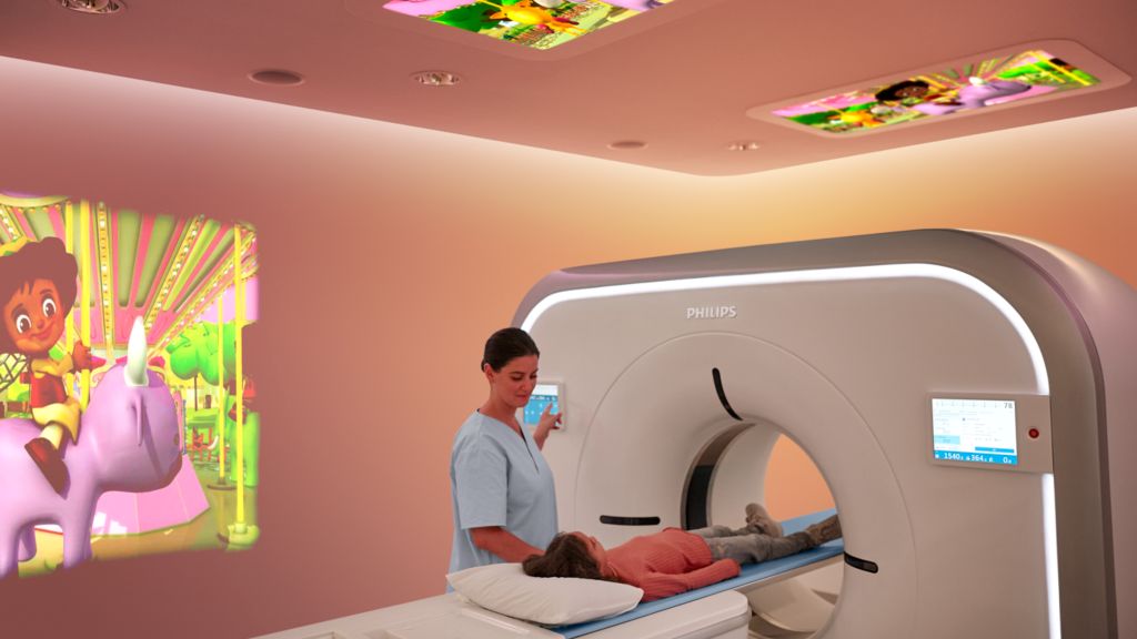 Clinician performing pediatric CT on Philips Incisive with Ambient Experience