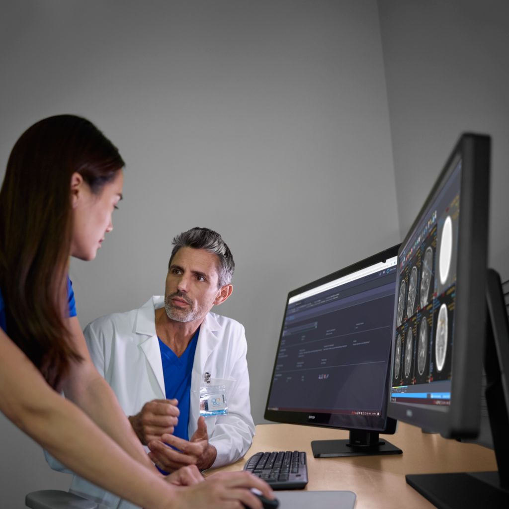 Diagnostic viewer female doctor looking at images Perfusion MR