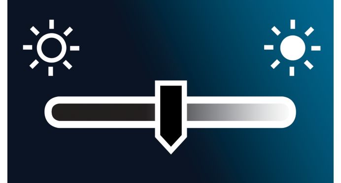 Adjustable display brightness for comfort viewing