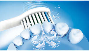 Action nettoyante dynamique Sonicare poussant le liquide entre les dents