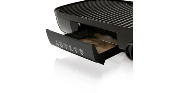 Healthy grilling through oblique grill plates, which dissipate excess fat