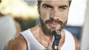 Detaljni metalni trimer definira rubove brade ili kozje bradice