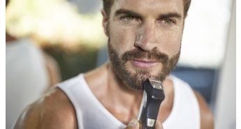 Детальный металлический триммер определяет края вашей бороды или бородки