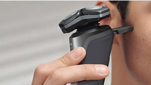 Precision trimmer integrated in the handle