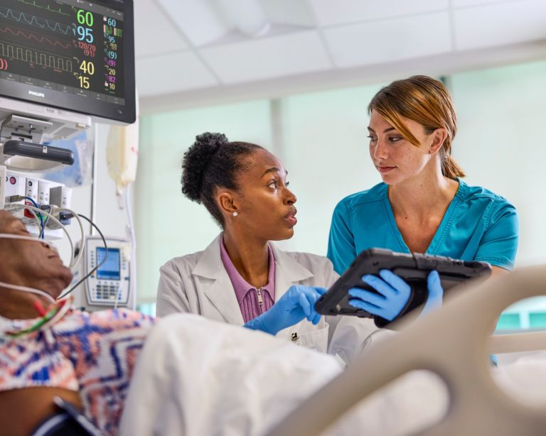 Clinician tending to patient