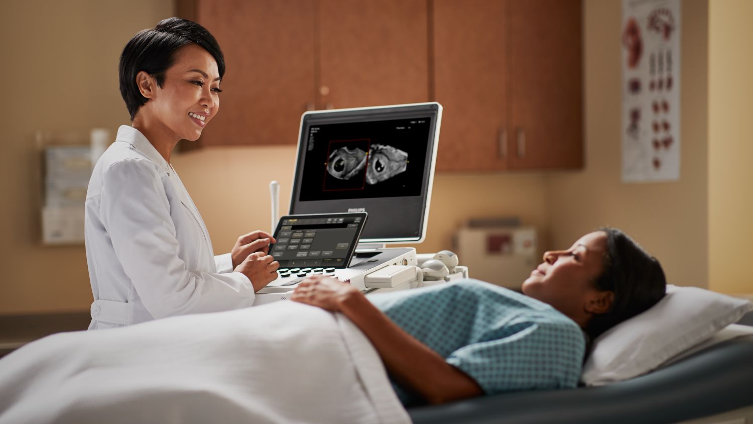 An OBGYN uses a Compact Ultrasound
