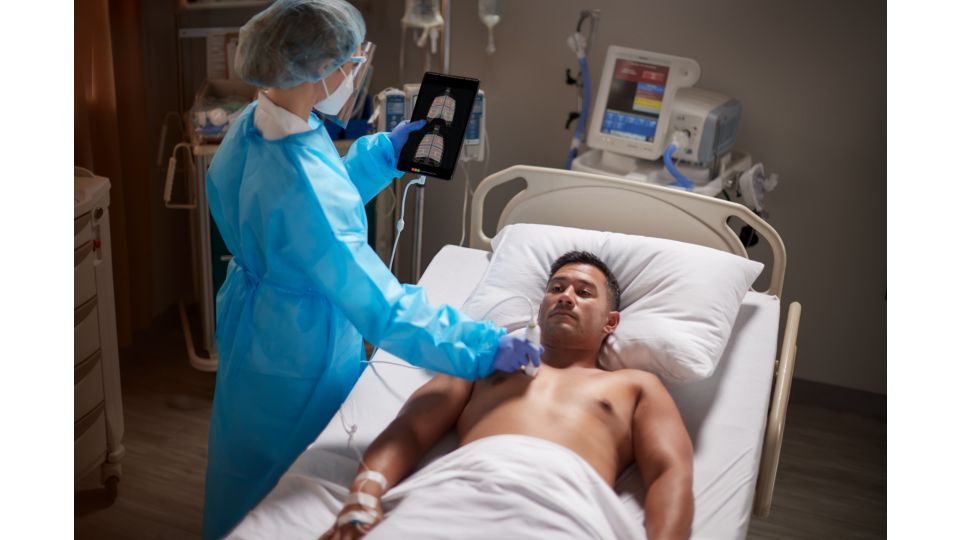 Man undergoing ultrasound in ED