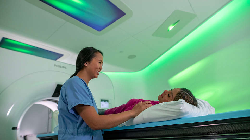 Philips Ambient CT7500 in use with a clinician and patient