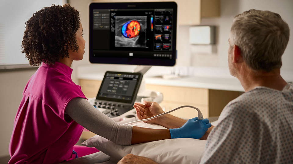 Philips EPIQ 10.0 being used by a clinician with a patient 