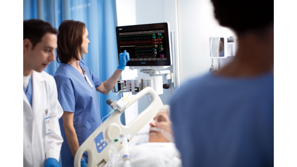 A care provider applies and explains Philips MCOT patch Media library
