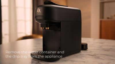 Support movie that explains how to install the water container position LOR BARISTA Absolu coffee machine for first time use