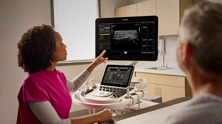 Lady explaining ultrasound scan