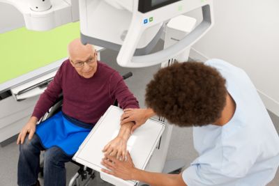 application tech, old male patient, wrist exam, SkyPlate