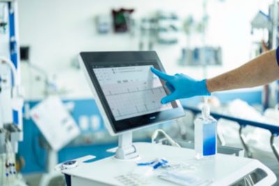 Doctor using cardiograph
