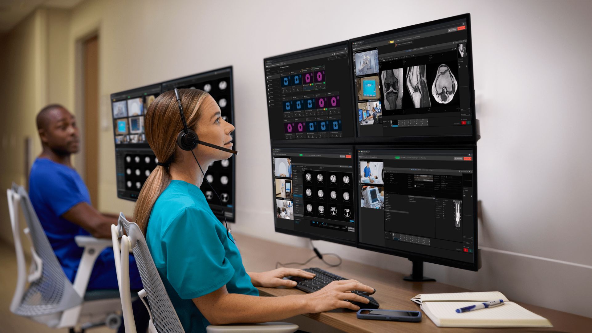 two techs reviewing radiology results