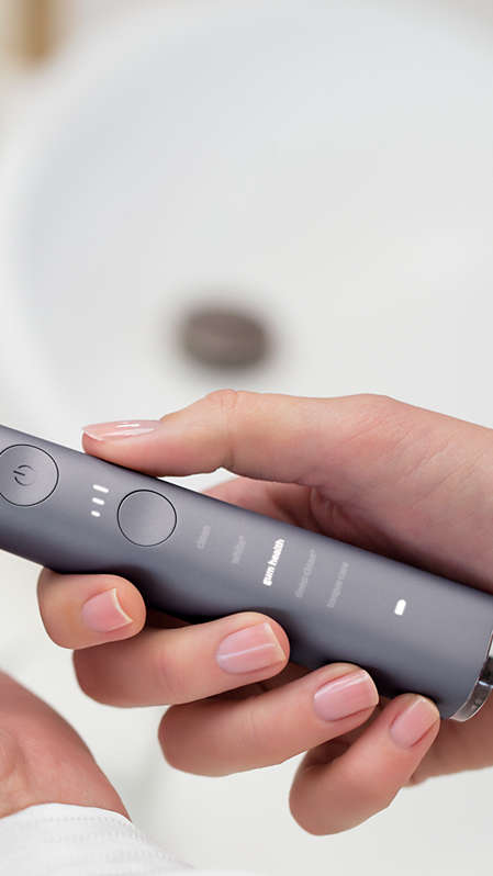 Hands holding a Philips Sonicare DiamondClean Smart