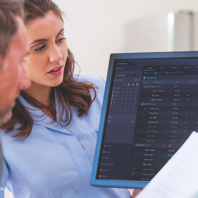 Clinician reviews files on computer