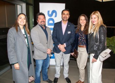 Healthcare professionals posing together at Philips Chile SOCHRADI radiology event