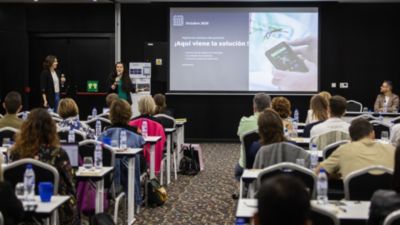 Speakers presenting clinical data management strategy to intensive care professionals