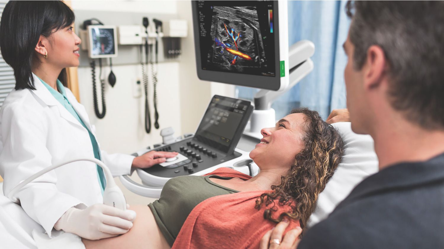Pregnant woman getting ultrasound