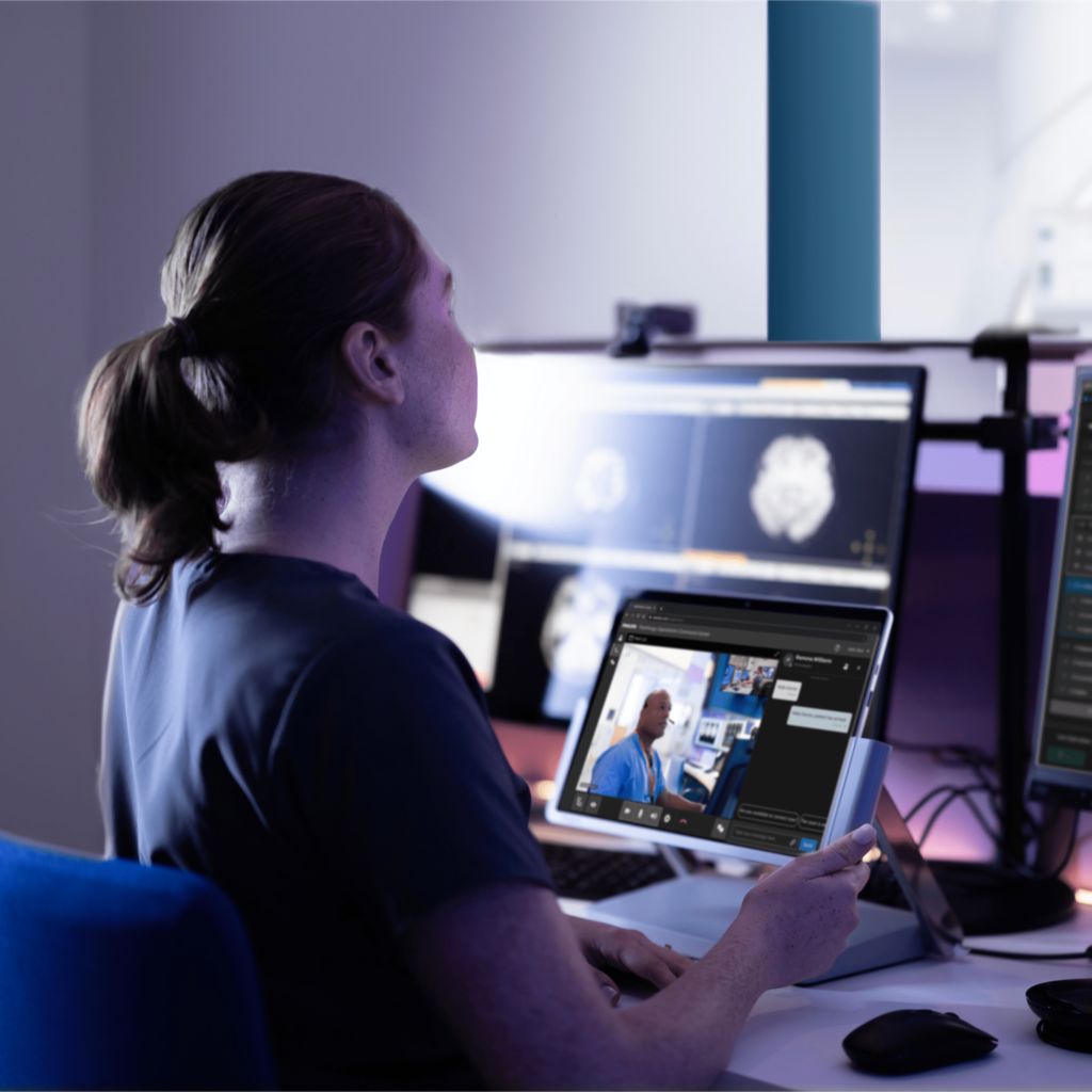  technologist watching at images