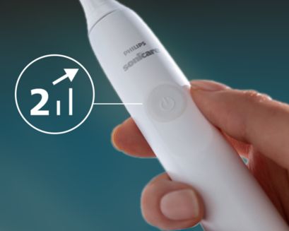 Closeup of hand holding a Sonicare 2300 handle