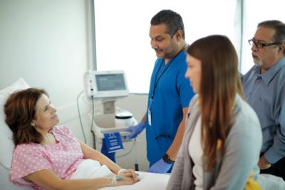 Female patient receiving care in hospital