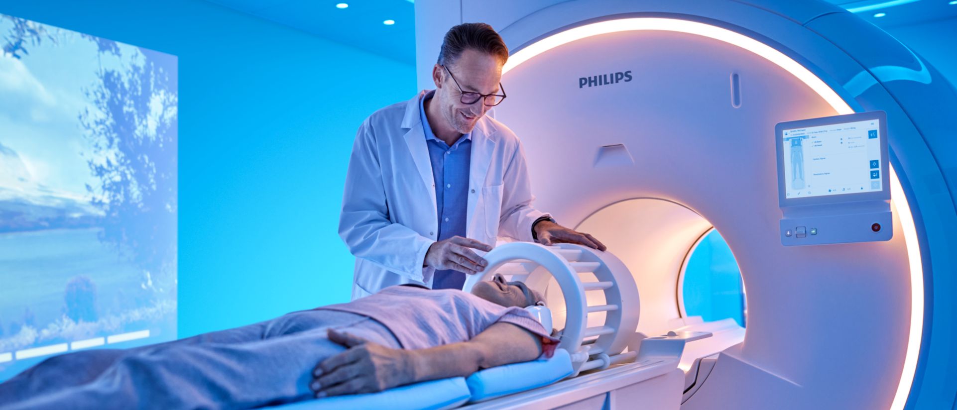 researcher positioning multi nuclei coil on patient 