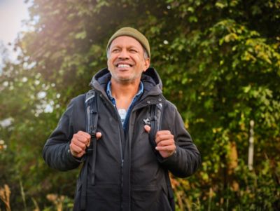 man standing outside wearing backpack