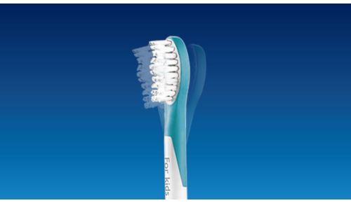 Rubberized brush head is designed to protect young teeth