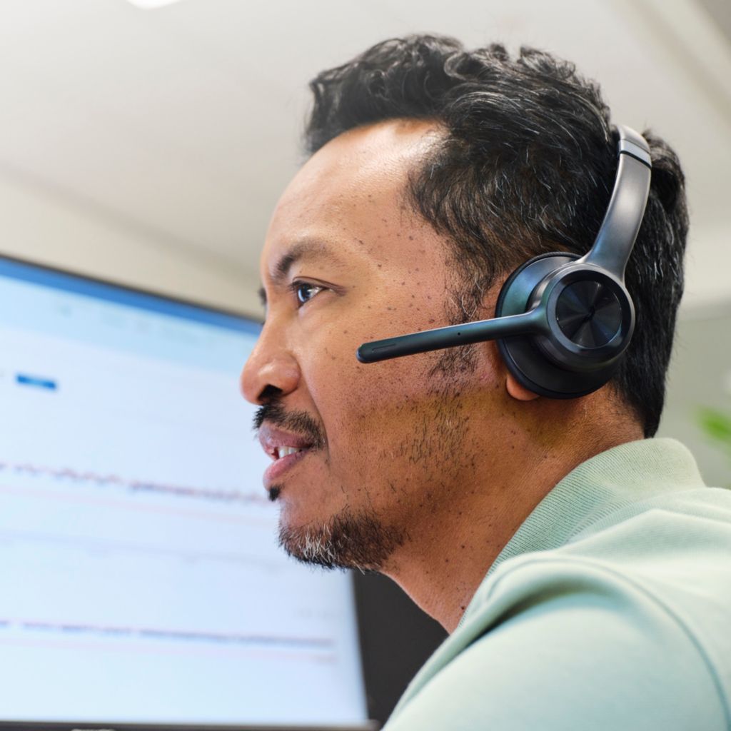 Philips remote engineer talking to customer through headset