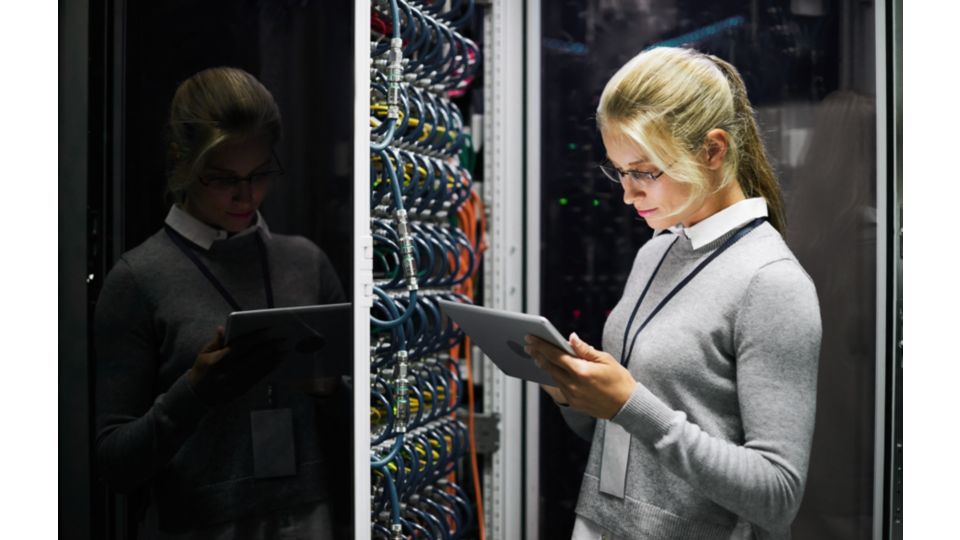 Field service engineer examining equipment