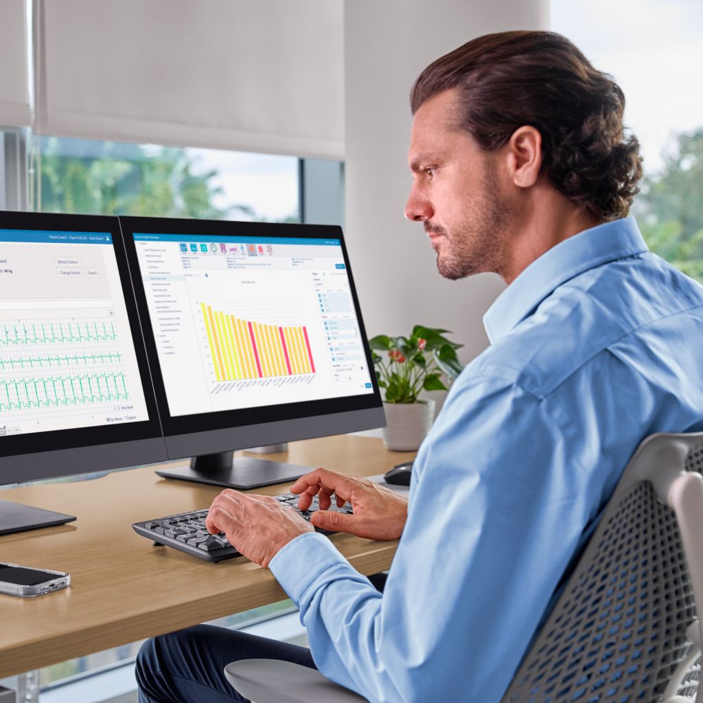 man looking at alarm insight viewer