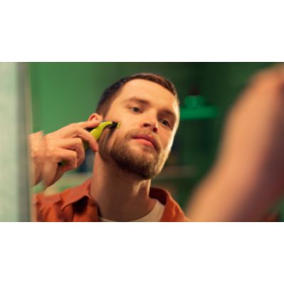  Philips Norelco OneBlade 360 - Maquinilla de afeitar eléctrica  híbrida y recortadora de barba para hombres con peine de rastrojos 5 en 1 y  kit de recortadora de vello corporal, QP2834/70 