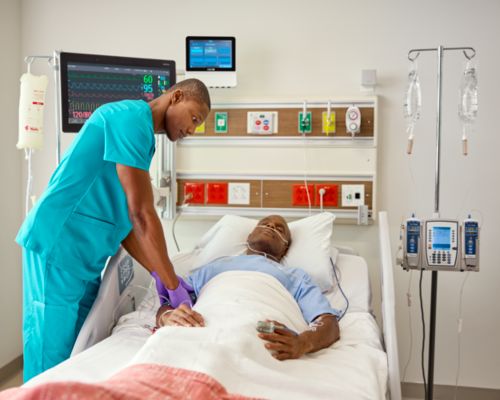 Nurse caring for patient showing interoperability