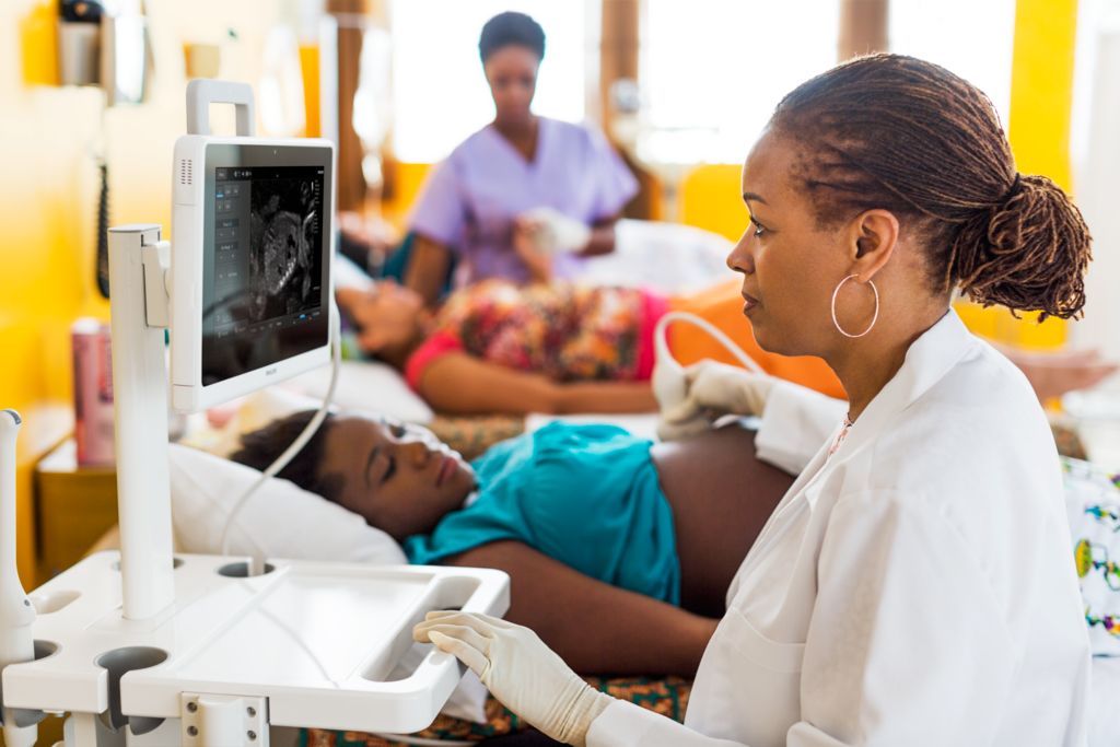 InnoSight Compact ultrasound for bedside scan, ward use. Obstetric image. Scanning pregnant patient.