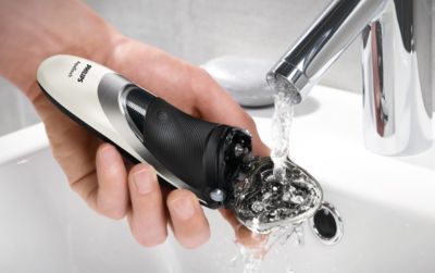 Washable shaver with QuickRinse system