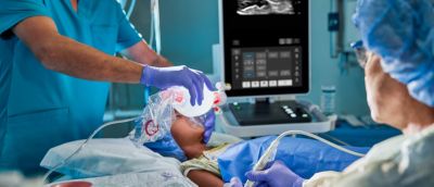 Vascular access procedure on pediatric anesthesia patient.