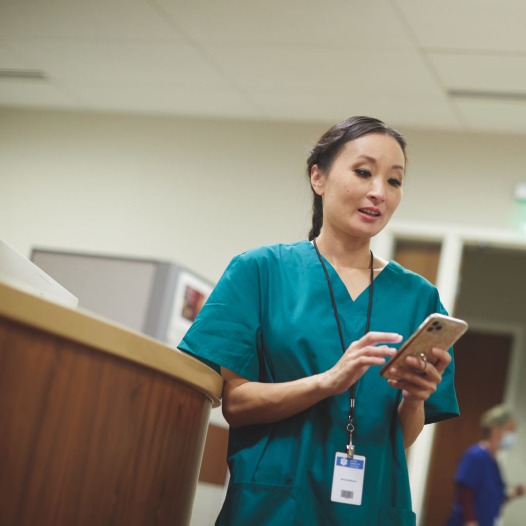 Clinician using mobility solutions on phone