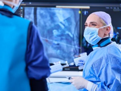 Clinician performs image guided procedure using Philips Azurion system in interventional suite
