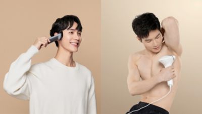 顔と体のケアにグルーミングデバイスを使用している男性