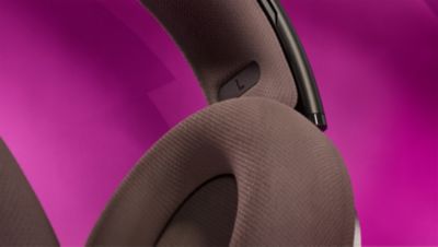 Dvoplasten naglavni trak in zračne ušesne blazinice