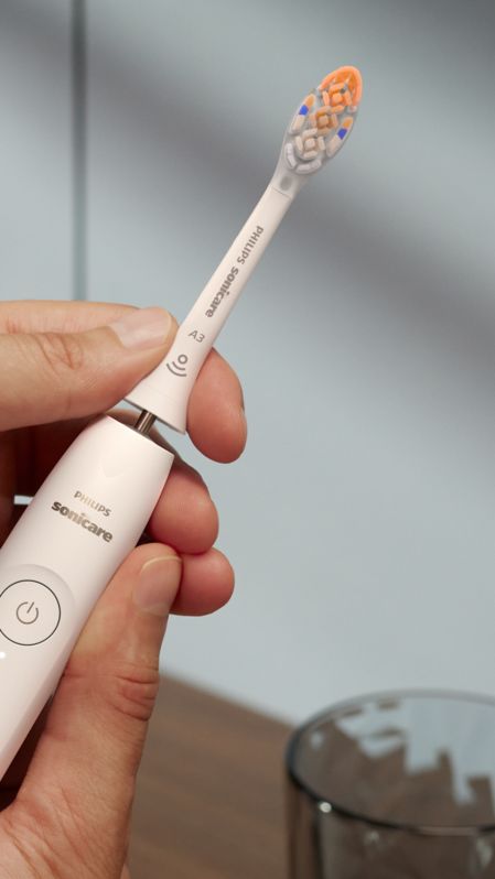 Philips Sonicare All-in-One brush heads standing on a countertop