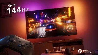 Philips Ambilight TV 65OLED+959 displaying fast-paced 144 Hz racing game