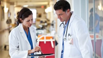 Two doctors discussing medical information